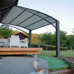 A wrought iron awning in a family house patio