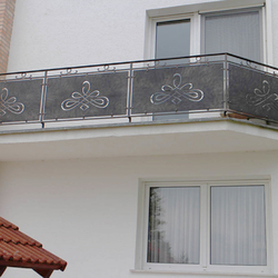 A modern wrought iron railing with a chain - balcony railings A modern wrought iron railing with a chain - balcony railings