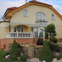 Roofing of the terrace in white color - forged shed from UKOVMI