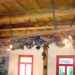 A wrought iron chandelier - ladder - Grapevine A wrought iron chandelier - ladder - Grapevine