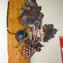 A wall wrought iron lamp - The vine with grapes A wall wrought iron lamp - The vine with grapes