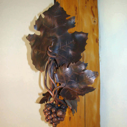 A wall forged lamp - The vine with grapes A wall forged lamp - The vine with grapes