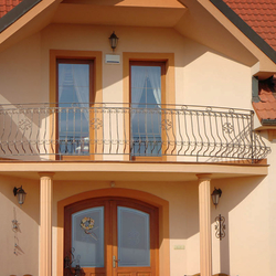 A wrought iron balcony railing