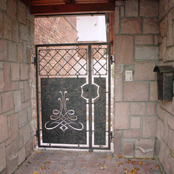 A modern wrought iron gate A modern wrought iron gate