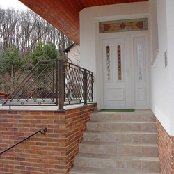 A wrought iron railing A wrought iron railing