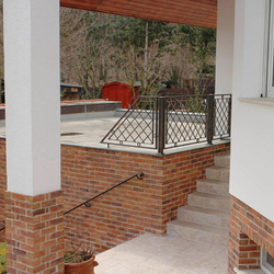 A wrought iron railing A wrought iron railing