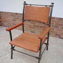 A wrought iron chair - A luxury chair A wrought iron chair - A luxury chair