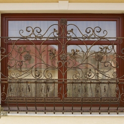 A decorative wrought iron grille