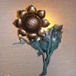 Slnečnica ako bočná lampa - luxusná lampa - ručne kované svietidlo tvorí osvetlenie wellness v Grand Hotel Praha Slnečnica ako bočná lampa - luxusná lampa - ručne kované svietidlo tvorí osvetlenie wellness v Grand Hotel Praha