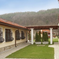 Decorative forged bars on the windows of a family house