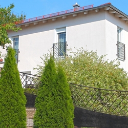 Wrought-iron French balcony railings of a family house in Germany and wrought-iron fencing made in UKOVMI