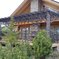 General view of the special cottage patio roofing in the High Tatras  artwork by the UKOVMI blacksmith workshop
