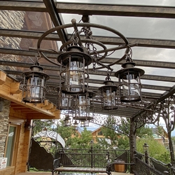 Hand forged chandelier for acottage patio  an original outdoor lighting
