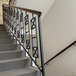 Simple metal railing with wooden handrail – interior staircase railing Simple metal railing with wooden handrail – interior staircase railing
