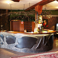 A forged reception desk with wrought iron sheets and high-quality beef leather